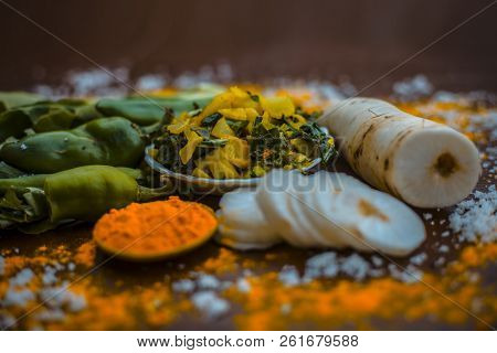 Close Up Of Popular Indian & Asian White Radish Salad Or Muli Ka Smabara On Wooden Surface With Whit
