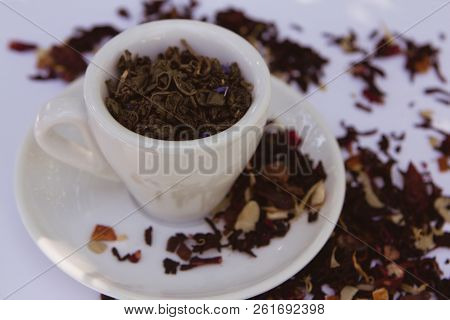 Top View Tea Cup With Herbs Petals