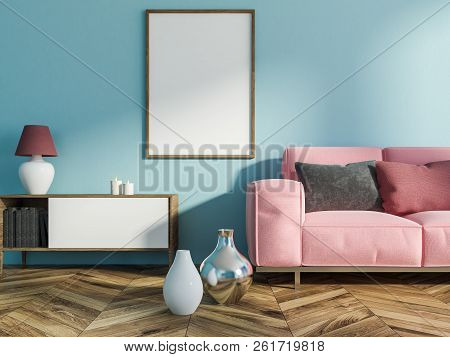 Interior Of Living Room With Light Blue Walls, Wooden Floor With Vases On It, A Cabinet With Books, 