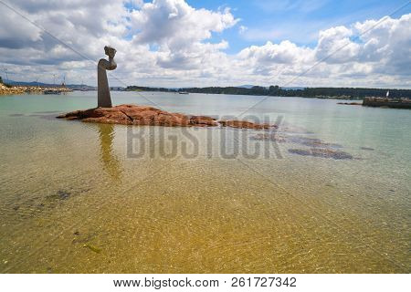O GROVE, PONTEVEDRA, GALICIA, SPAIN - JUNE 4: Sculpture on a rock located in Confin Beach of Peralto on June 4, 2017 in O Grove, Pontevedra, Galicia, Spain