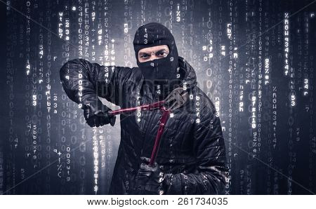 Burglar in action with encoded concept and his tools in his hand. 
