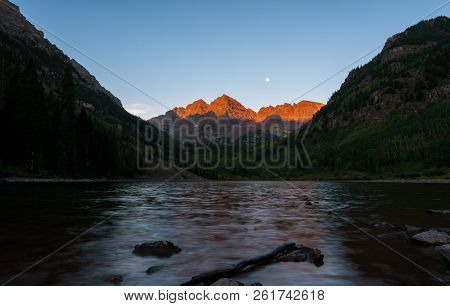Golden Hour Sunrise Alpine Glow Hitting The Maroon Bells At Maroon Lake In The Valley Of Massive Pea