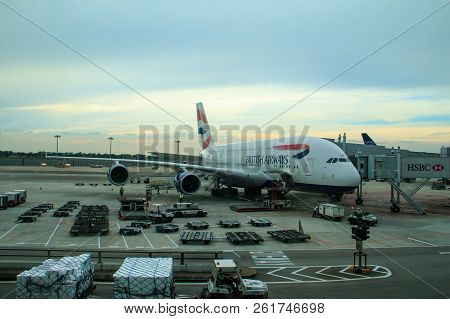 Changi, Singapore-june 07, 2017 :aircraft In Connecting Bridge To The Gate And  Preparing A Passenge