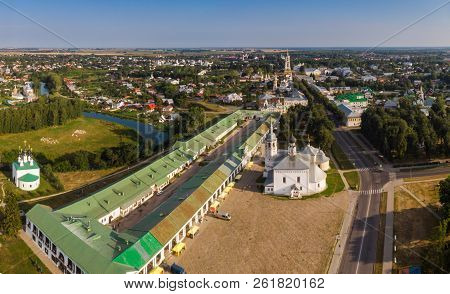 Beautiful Panoramic View Of Suzdal In Summer At Sunrise. Resurrection Church On The Market Square In