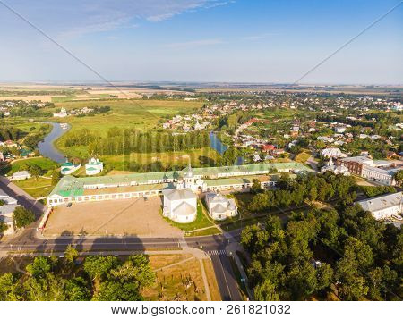 Beautiful Panoramic View Of Suzdal In Summer At Sunrise. Resurrection Church On The Market Square In