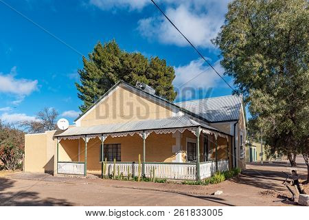 Loxton, South Africa, August 7, 2018: A Street Scene, With An Historic House, In Loxton In The North