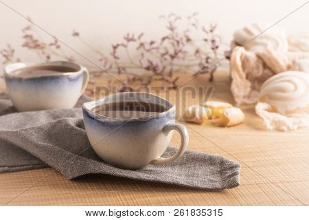 Coockies With Egg White Cover. Portuguese Sweets Known As Cavacas Served With Tea On Ceramic Cups.