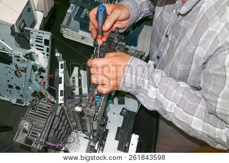 Repair Of The Laser Copier-printer In The Service Center. Replacing Worn Gears