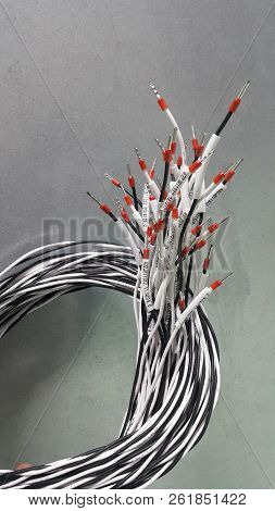 Electrical Parts And Mechanical Parts On Big Gear And Drum Rolls On White Floor
