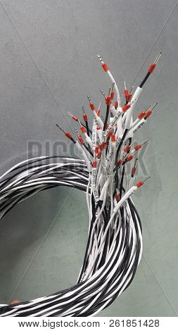 Electrical Parts And Mechanical Parts On Big Gear And Drum Rolls On White Floor