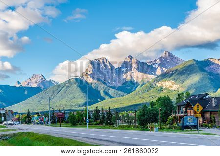 Canmore,canada - July 1,2018 - Morning View At The Three Sisters Mountains In Canmore. Canmore Is A 