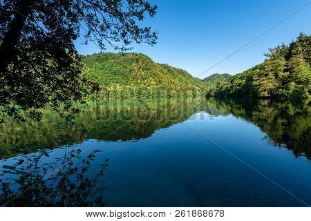Lago Di Levico (lake) With Mountain And Forest, Levico Terme, Italy, Europe