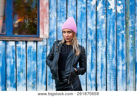 Portrait Female Student On Bright Background. Beautiful Modern Urban Young Woman Wearing Pink Knitti