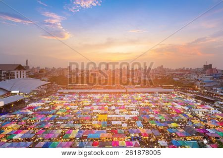 City Flea Market Aerial View With Central Business Downtown Background, Cityscape