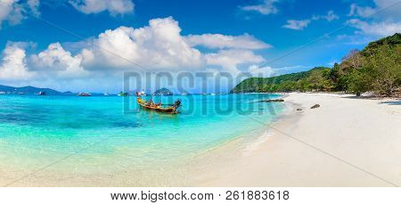 Panorama Of Traditional Long Tail Boat On Coral (ko He) Island Near Phuket Island, Thailand In A Sum