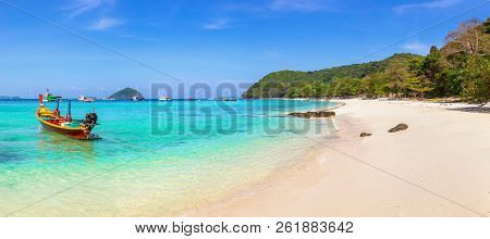 Panorama Of Traditional Long Tail Boat On Coral (ko He) Island Near Phuket Island, Thailand In A Sum
