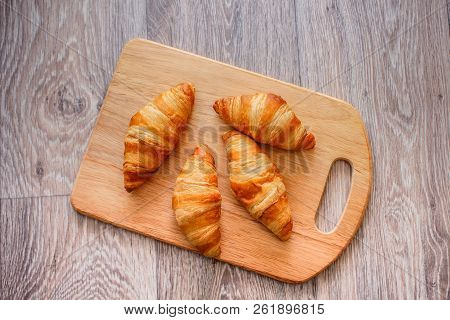 A Rich Variety Of Food Photography Croissant.
Delicious Croissants On A Square White Plate On A Wood