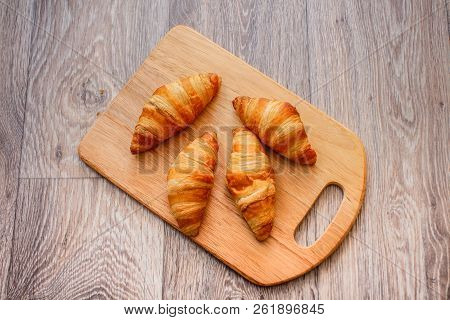 A Rich Variety Of Food Photography Croissant.
Delicious Croissants On A Square White Plate On A Wood