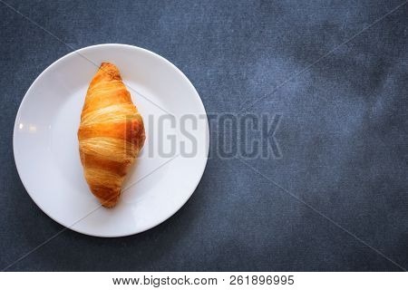 A Rich Variety Of Food Photography Croissant.
One Delicious Croissant On A Dessert White Plate On Da