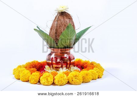 Copper Kalash With Coconut , Leaf And Floral Decoration On A White Background. Essential In Hindu Pu