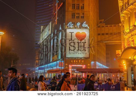 Shanghai/china -  January 24 2015: Night Life Of People Walking In Nanjing Road Walking Street In Sh