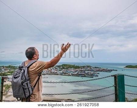 Asisn Fat Backpacker Stand On Top Of  Khao Ma Jor Pier  With Idyllic Ocean Beautiful White Cloud End