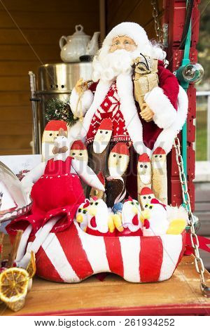Portrait Of Happy Santa Claus Holding Sack With Gifts