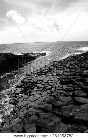 A View Of The Prehistoric Volcanic Geological Rock Formations On The Scottish Island Of Staffa