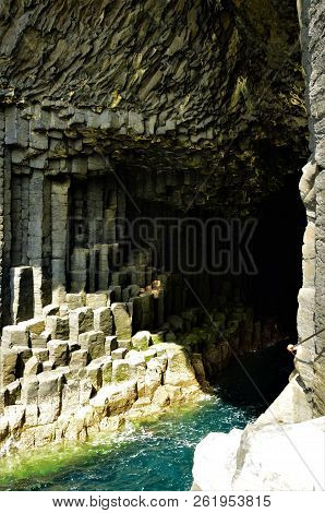 A View Of The Prehistoric Volcanic Geological Rock Formations On The Scottish Island Of Staffa