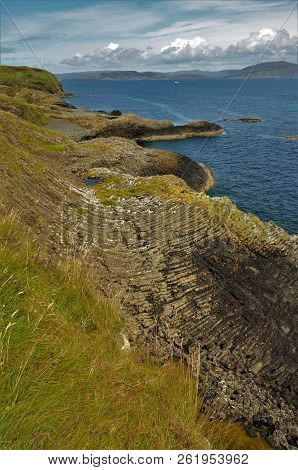 A View Of The Prehistoric Volcanic Geological Rock Formations On The Scottish Island Of Staffa