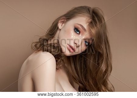 Beauty Portrait Of A Sexy Blonde Woman With Big Blue Eyes, Natural Cosmetics, Clean Delicate Skin Of