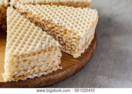 Waffle Cake Made Of Crispy Waffle Cakes With Boiled Condensed Milk On A Gray Background. Quick Sweet