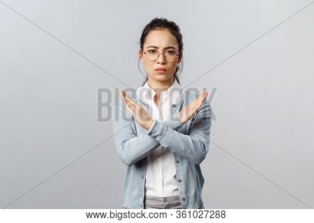 We Must End It. Serious-looking Determined Young Confident Asian Woman, Making Cross Stop Sign And L