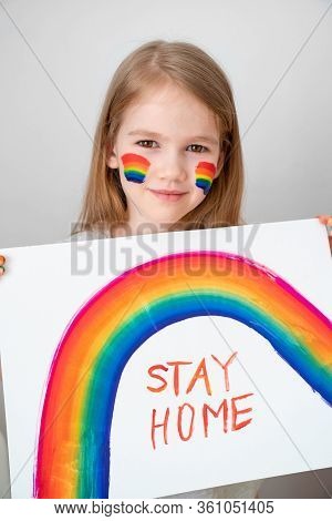 A Little Girl With Blond Hair Drew A Rainbow And A Poster Stay Home. Flashmob Chasetherainbow.