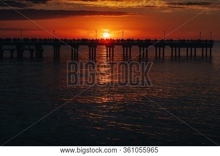 Sunset On The Pier In Palanga, Baltic Sea