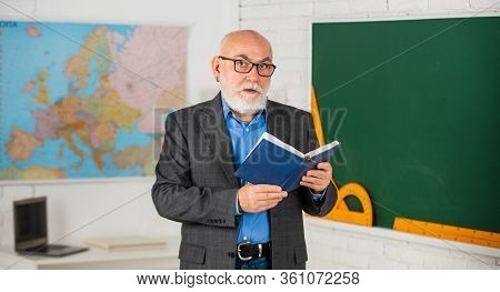 Back To School. Education In Retro School. Bearded Man Give Marks In Diary. Write Notes In Book. Sen