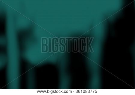 Abstract Blurred Green Dark And Black Colors Gloomy Background For Design.