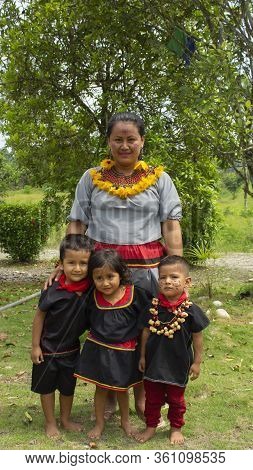 Lago Agrio, Sucumbios / Ecuador - February 20 2020: Woman Of The Cofan Ethnic Group Applying Makeup 