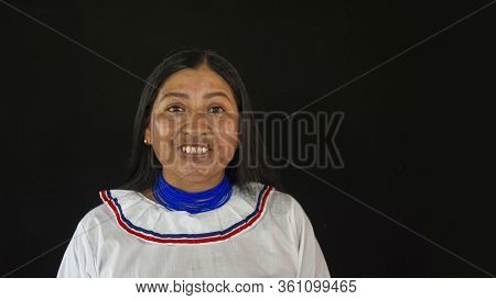 Lago Agrio, Sucumbios / Ecuador - February 20 2020: Woman Of The Cofan Ethnic Group Applying Makeup 