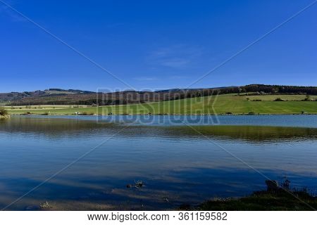 Spring Sun Walk Around A Large Lake In The Czech Republic.