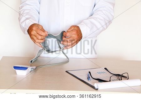 Close-up - Doctor Measures Blood Pressure