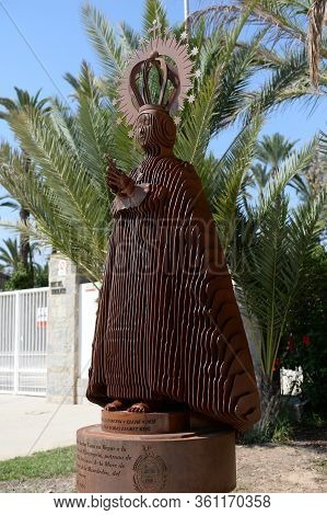 Elche, Spain - September 20, 2018:sculpture Of A Clergyman At A Municipal Park In The City Of Elche.