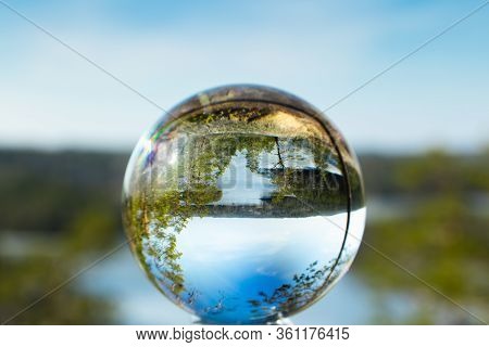 Beautiful Landscape In Glass Ball With Icy Lake In The National Park Repovesi, Finland