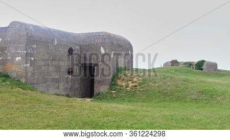 Remains Of The German Battery Which Was Captured On June 07 1944, Bunker And Artillery Guns