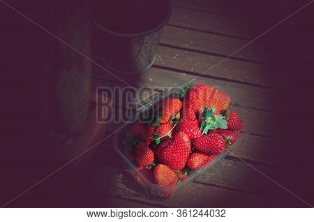 Strawberries In The Basket. Strawberries On The Table. Summer Strawberries In The Garden. Berries In