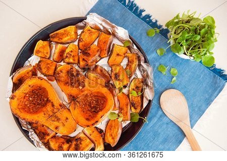 Top View Baked Roasted Grilled Whole Orange Pumpkin Butternut Squash And Sweet Potato Slides With He