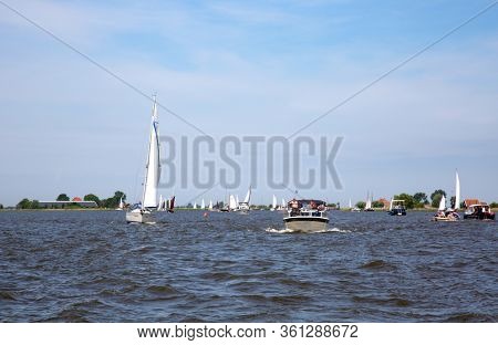 Heeg, Friesland, The Netherlands - June 2, 2019; Ships at the Heeger Lake in Heeg, Friesland, The Netherlands