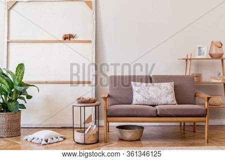 Stylish Interior Design Of Living Room At Cozy Apartment With Brown Sofa, Coffee Table, Wooden Cube,
