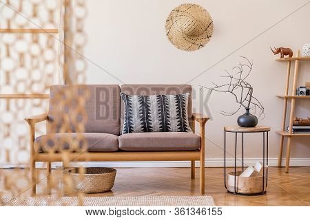 Stylish Interior Design Of Living Room At Cozy Apartment With Brown Sofa, Coffee Table, Wooden Cube,