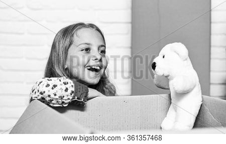 Little Child Open Post Package With Toys. Deliver Your Treasures. Storage For Toys. Delivering Happi
